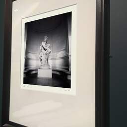 Art and collection photography Denis Olivier, Protection And Future Statue, Palais Galliera, Paris, France. February 2022. Ref-11530 - Denis Olivier Photography, brown wood old frame on dark gray background