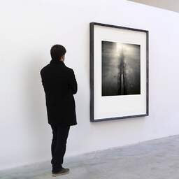 Art and collection photography Denis Olivier, Rail, Escuela Taller, San Vicenter, Spain. May 2007. Ref-1102 - Denis Olivier Art Photography, A visitor contemplate a large original photographic art print in limited edition and signed in a black frame