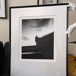 Art and collection photography Denis Olivier, Rampart Shelter, Edinburgh Castle, Scotland. August 2022. Ref-11689 - Denis Olivier Art Photography, large original 9 x 9 inches fine-art photograph print in limited edition and signed hold by a galerist woman