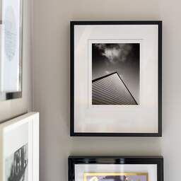 Art and collection photography Denis Olivier, Roof, La Madeleine, France. November 2022. Ref-11620 - Denis Olivier Art Photography, original fine-art photograph signed in limited edition in a black wooden frame with other images hung on the wall