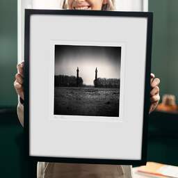 Art and collection photography Denis Olivier, Rostral Columns, Place Des Quinconces, Bordeaux, France. March 2008. Ref-1297 - Denis Olivier Photography, original 9 x 9 inches fine-art photograph print in limited edition and signed hold by a galerist woman