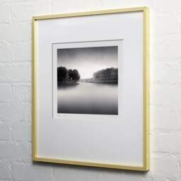Art and collection photography Denis Olivier, Saint-Louis Island, Paris, France. August 2021. Ref-11487 - Denis Olivier Photography, light wood frame on white wall