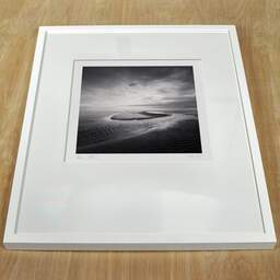 Art and collection photography Denis Olivier, Sand Shape, Newburgh Beach, Aberdeenshire, Scotland. August 2022. Ref-11573 - Denis Olivier Art Photography, white frame on a wooden table