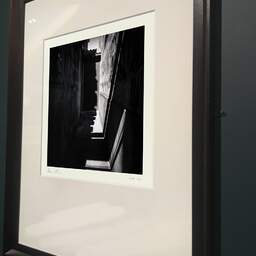 Art and collection photography Denis Olivier, Secret Door Alley, Talence, France. April 2021. Ref-1412 - Denis Olivier Photography, brown wood old frame on dark gray background