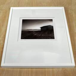 Art and collection photography Denis Olivier, Shed By The Lake, Etude 2, Carreyre, Lacanau Lake, France. January 2021. Ref-11610 - Denis Olivier Photography, white frame on a wooden table