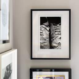 Art and collection photography Denis Olivier, Shoes, Poitiers, France. December 1990. Ref-94 - Denis Olivier Art Photography, original fine-art photograph signed in limited edition in a black wooden frame with other images hung on the wall