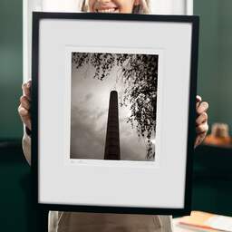 Art and collection photography Denis Olivier, Smokestack, Vertou, France. August 2021. Ref-11604 - Denis Olivier Photography, original 9 x 9 inches fine-art photograph print in limited edition and signed hold by a galerist woman