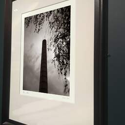 Art and collection photography Denis Olivier, Smokestack, Vertou, France. August 2021. Ref-11604 - Denis Olivier Photography, brown wood old frame on dark gray background