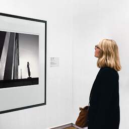 Art and collection photography Denis Olivier, Statue And Eiffel Tower, Trocadero, Paris, France. February 2022. Ref-11531 - Denis Olivier Art Photography, A woman contemplate a large original photographic art print in limited edition and signed in a black frame