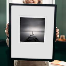 Art and collection photography Denis Olivier, Striped Pole, Etude 1, Lake Maggiore, Switzerland. August 2014. Ref-11441 - Denis Olivier Art Photography, original 9 x 9 inches fine-art photograph print in limited edition and signed hold by a galerist woman