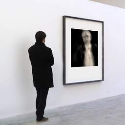 Art and collection photography Denis Olivier, Etude 8, The Swan Lake, Berlin, Germany. April 1998. Ref-858 - Denis Olivier Art Photography, A visitor contemplate a large original photographic art print in limited edition and signed in a black frame