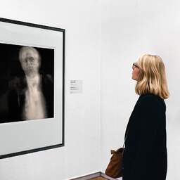 Art and collection photography Denis Olivier, Etude 8, The Swan Lake, Berlin, Germany. April 1998. Ref-858 - Denis Olivier Art Photography, A woman contemplate a large original photographic art print in limited edition and signed in a black frame