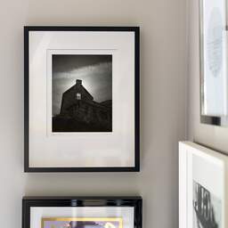Art and collection photography Denis Olivier, Sun Behind The Window, Edinburgh Castle, Scotland. August 2022. Ref-11647 - Denis Olivier Art Photography, original fine-art photograph signed in limited edition in a black wooden frame with other images hung on the wall