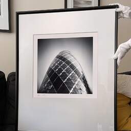 Art and collection photography Denis Olivier, The Gherkin, Etude 1, The City, London, England. April 2014. Ref-11459 - Denis Olivier Art Photography, large original 9 x 9 inches fine-art photograph print in limited edition and signed hold by a galerist woman