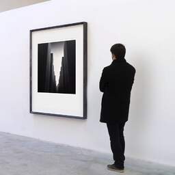 Art and collection photography Denis Olivier, The Jews Memorial, Etude 1, Berlin, Germany. October 2014. Ref-11466 - Denis Olivier Art Photography, A visitor contemplate a large original photographic art print in limited edition and signed in a black frame
