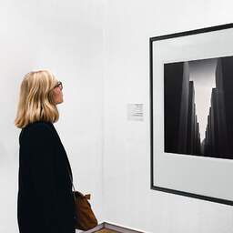 Art and collection photography Denis Olivier, The Jews Memorial, Etude 1, Berlin, Germany. October 2014. Ref-11466 - Denis Olivier Art Photography, A woman contemplate a large original photographic art print in limited edition and signed in a black frame