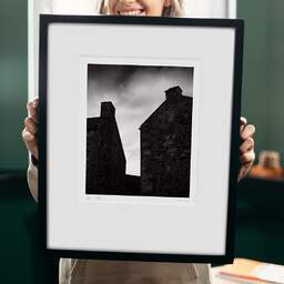 Art and collection photography Denis Olivier, Two Chimneys, Edinburgh, Scotland. August 2022. Ref-11616 - Denis Olivier Photography, original 9 x 9 inches fine-art photograph print in limited edition and signed hold by a galerist woman