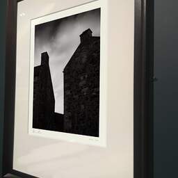Art and collection photography Denis Olivier, Two Chimneys, Edinburgh, Scotland. August 2022. Ref-11616 - Denis Olivier Photography, brown wood old frame on dark gray background