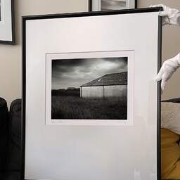 Art and collection photography Denis Olivier, Two Houses, Newburgh, Aberdeenshire, Scotland. August 2022. Ref-11614 - Denis Olivier Art Photography, large original 9 x 9 inches fine-art photograph print in limited edition and signed hold by a galerist woman