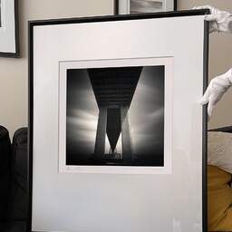 Art and collection photography Denis Olivier, Vasco Da Gama Bridge, Etude 2, Lisbon, Portugal. May 2007. Ref-1091 - Denis Olivier Art Photography, large original 9 x 9 inches fine-art photograph print in limited edition and signed hold by a galerist woman