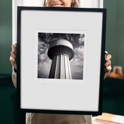 Art and collection photography Denis Olivier, Water Tower, Haut-Brion, Pessac, France. October 2022. Ref-11598 - Denis Olivier Art Photography, original 9 x 9 inches fine-art photograph print in limited edition and signed hold by a galerist woman