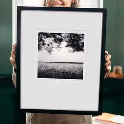 Art and collection photography Denis Olivier, Windy Fields, Le Croisic, France. April 2022. Ref-11556 - Denis Olivier Photography, original 9 x 9 inches fine-art photograph print in limited edition and signed hold by a galerist woman