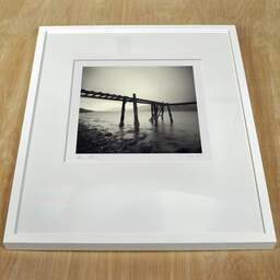 Art and collection photography Denis Olivier, Wooden Pontoon, Etude 2, Fort-William, Scotland. April 2006. Ref-980 - Denis Olivier Photography, white frame on a wooden table